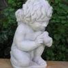 Cherub With Bird Statue