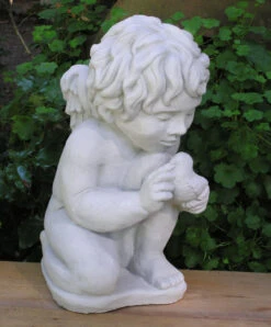 Cherub With Bird Statue